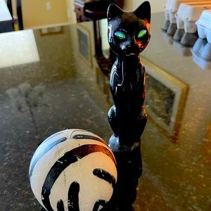 Beautiful, sleek black cat 🐈‍⬛ AND wooden round candle